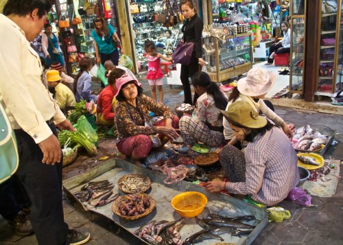 The woman just left of center in this picture, with her facial expression, really makes this picture for me.  The vibrant colors all around really add to the effect too.