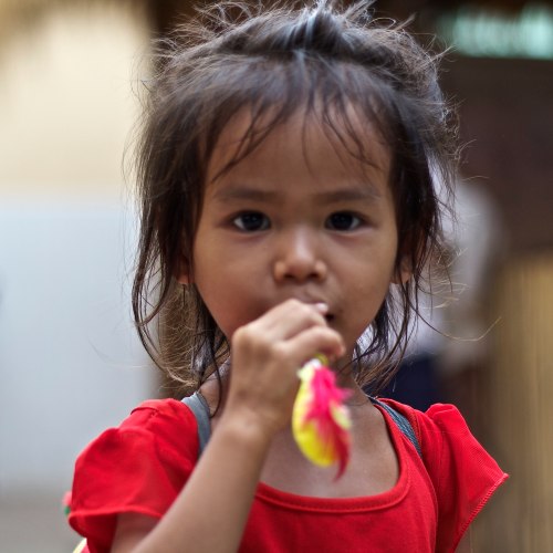 I'm a bit upset at myself about the way this picture turned out.  Shot with my 50mm prime and a 1.8, I missed the fact that the focal point was the hair just behind this girls neck.  That said - it's still a good picture.